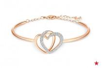 wedding photo - Swarovski Rose Gold-Tone Crystal Pavé Interlocking Double Heart Bangle Bracelet