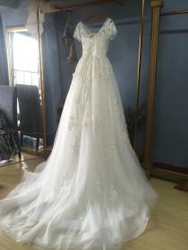 wedding photo -  Aliexpress.com : Buy Boat Neck A line/Princess Ivory Tulle Wedding Dress with Short Sleeves from Reliable wedding dress with swarovski crystals suppliers on Gama Wedding Dress