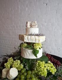 wedding photo - Not into sugar? This literal cheese cake is your savory cake alternative