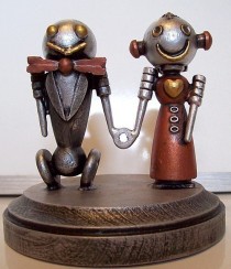 wedding photo - Robot Bride and Groom Wedding Cake Topper Classic V2 with Red Dress Holding Hands Wood Statues with Base