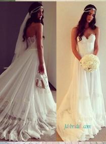 wedding photo -  Ethereal boho wedding dress with lace sweetheart bodice