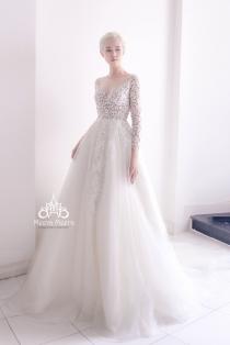 wedding photo -  A-line wedding dress with long sleeves and Illusion neckline from Meera Meera