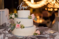 wedding photo -  Silver "Love" wedding cake topper.