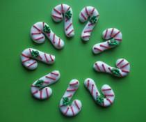 wedding photo - Royal icing candy canes  --  Handmade Christmas x-mas cake decorations cupcake toppers (12 pieces)