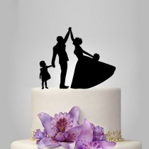 wedding photo -  bride and groom funny wedding cake topper, with kid cake topper