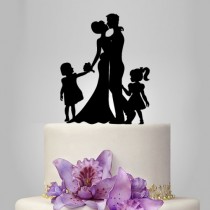 wedding photo -  bride and groom wedding cake topper with girl, topper with child