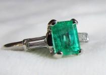 wedding photo - Emerald Ring Vintage Emerald Engagement Ring 0.79ct Columbia Emerald cut Emerald 0.10cttw baguette diamonds Platinum