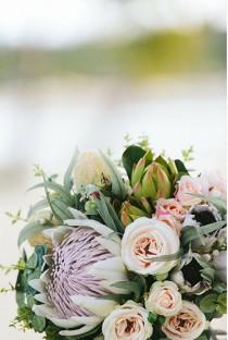 wedding photo - Nellie - Bride's bouquet. Australian natives and roses. King protea, proteas, banksia, roses, blushing bride, gum, Geraldton wax.