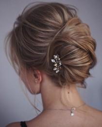 wedding photo - This French Twist Updo Hairstyle Perfect For Any Wedding Venue