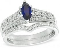 wedding photo - Marquise Lab-Created Blue Sapphire and 1/5 CT. T.W. Diamond Vintage-Style Bridal Set in 10K White Gold