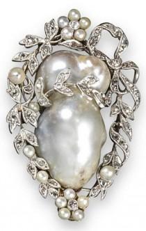 An Early 20th Century Pearl And Diamond Brooch. The Baroque Pearl Set Within A S wedding photo - An Early 20th Century Pearl And Diamond Brooch. The Baroque Pearl Set Within A S