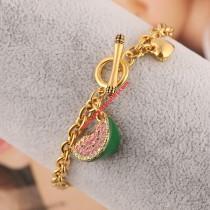 wedding photo -  Juicy Couture Gold-Tone Diamond Enamel Glaze Watermelon Charm Toggle Bracelet