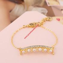 wedding photo -  Juicy Couture Gold-Tone Diamond Pearl Crown Charm Hook Bracelet