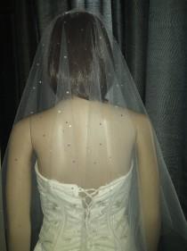 wedding photo -  Ivory drop veil. No gather veil. Cut edged scattered with Swarovski crystals in heavy at centre to light outer design. Pale ivory or White.